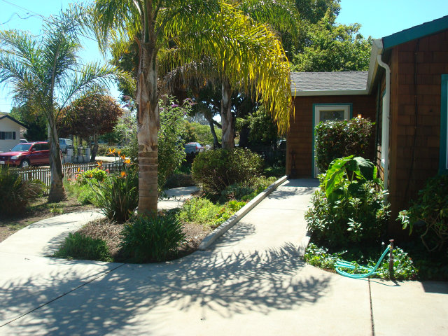 3401 Roland Drive Santa Cruz, CA 95062 - Photo 3 of 20 a view of a garden with pathway