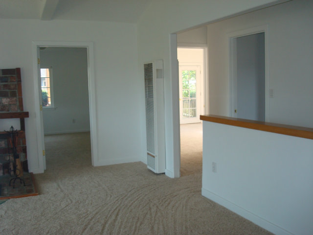 3401 Roland Drive Santa Cruz, CA 95062 - Photo 10 of 20 an empty room with windows