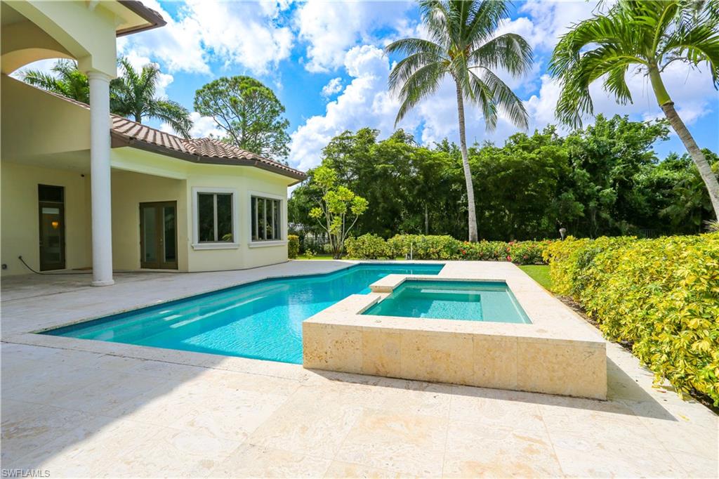 823 Cassena Road Naples, FL 34108 - Photo 7 of 50 a view of outdoor space yard and swimming pool