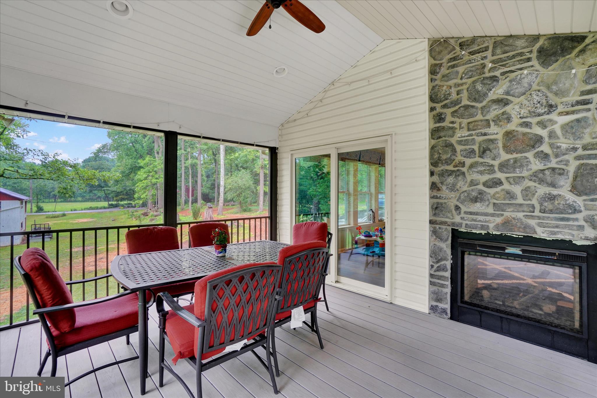 537 Miller Road Elizabethtown, PA 17022 - Photo 6 of 41 Screened Porch w Double Sided Fireplace