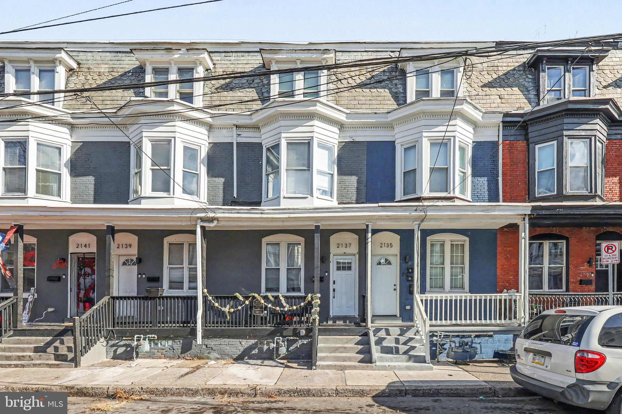 front view of a building with a street
