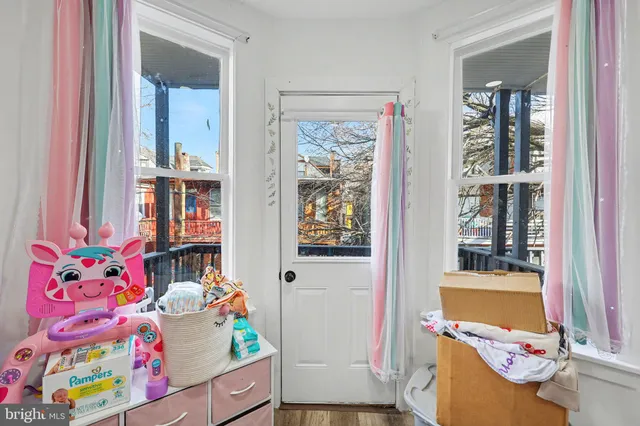 a bedroom with a bed and cabinets