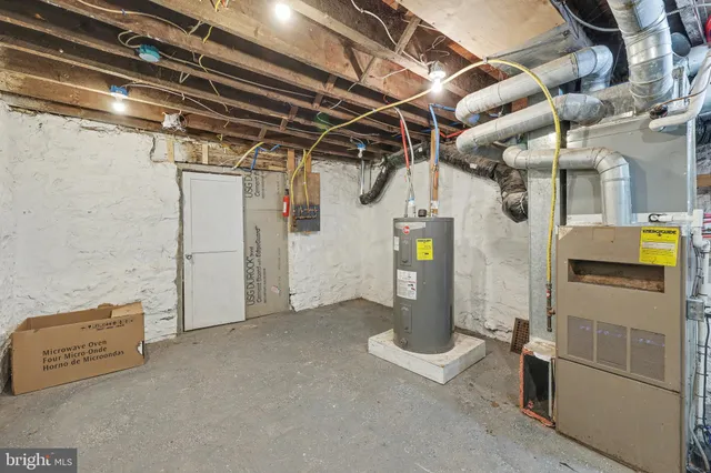 a view of porch with wooden stairs and floor to ceiling window