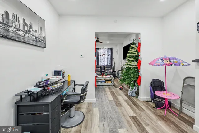 a view of a workspace with furniture