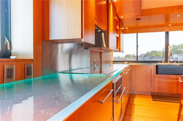 a view of a pool table with chairs