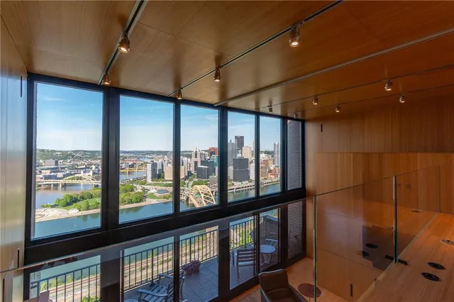 a view of an empty room with a large window