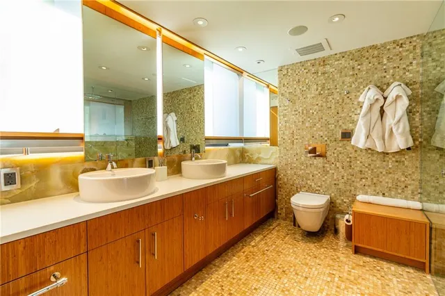 a bathroom with a bathtub and shower