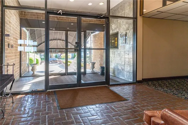 a view of a hallway with couch