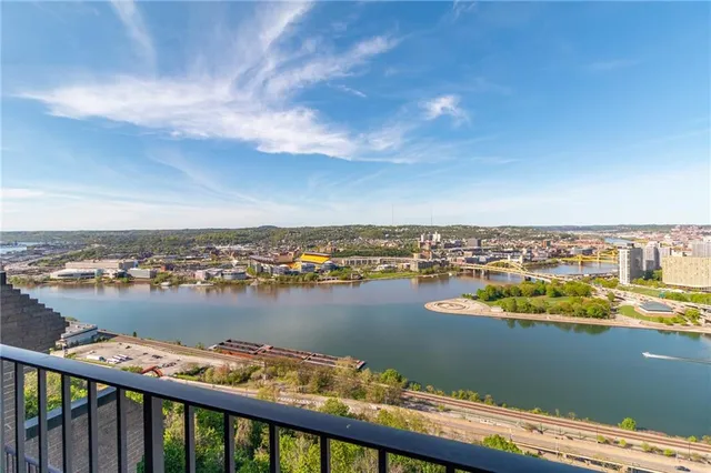 a view of a city and ocean view