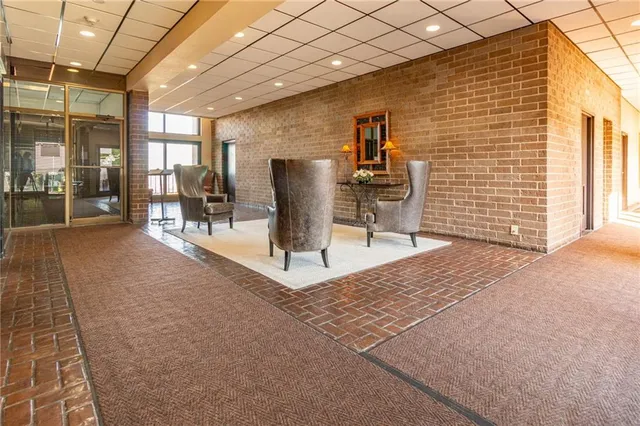 a view of tall buildings and a street