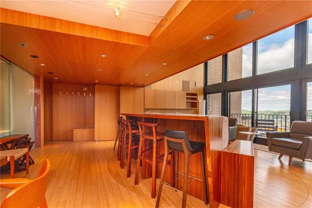 a dining area with a table and chairs in it