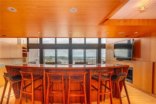 a outdoor living space with furniture and city view