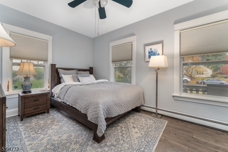22 Fairview Avenue Clinton, NJ 08809 - Photo 15 of 31 a bedroom with a bed lamps and window