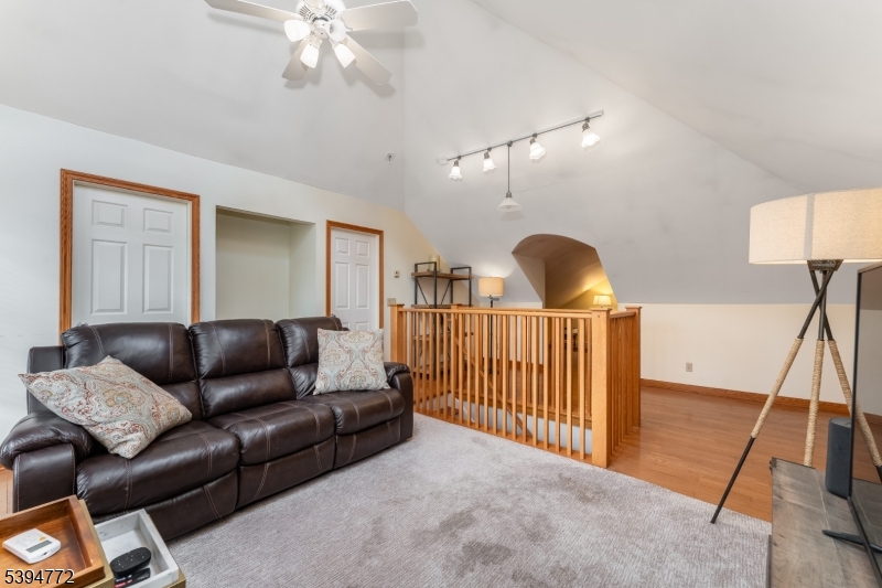 22 Fairview Avenue Clinton, NJ 08809 - Photo 17 of 31 a living room with furniture and a chandelier