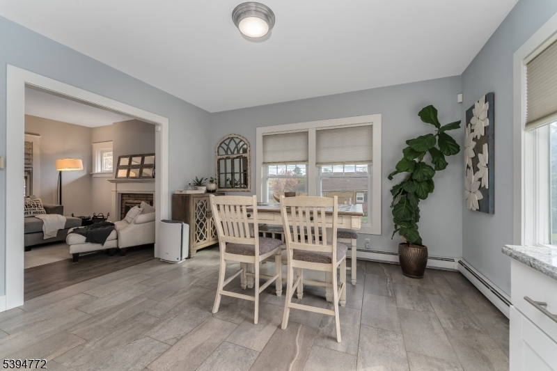 22 Fairview Avenue Clinton, NJ 08809 - Photo 7 of 31 a view of a livingroom with furniture and a potted plant