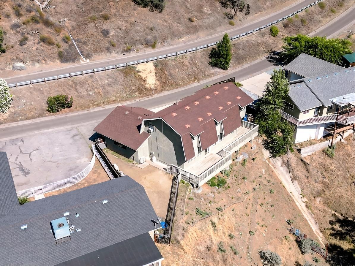27817 Sky Harbour Road Friant, CA 93626 - Photo 31 of 36 an aerial view of a house with a yard
