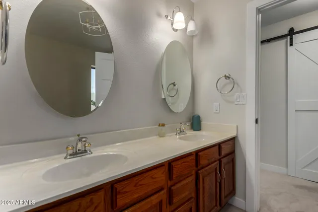 a view of a livingroom with furniture and a garage
