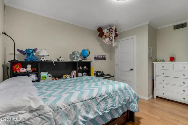 a view of a backyard with swimming pool