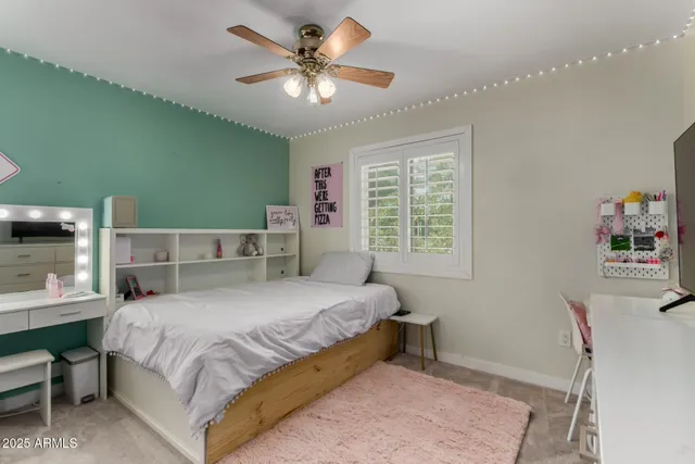a view of a house with swimming pool and sitting area
