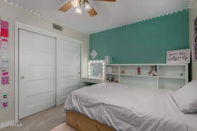 a view of a house with swimming pool yard and sitting area