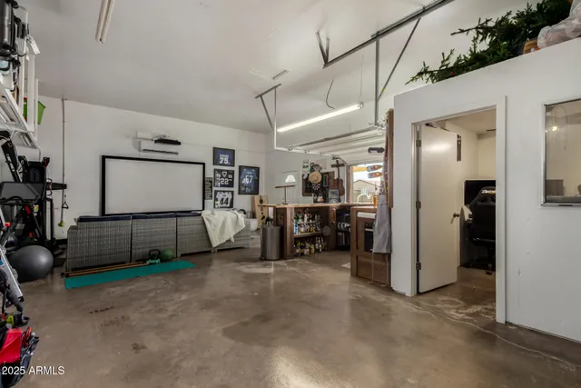 a swimming pool with outdoor seating and yard