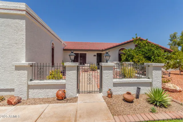 a view of a backyard with tree s