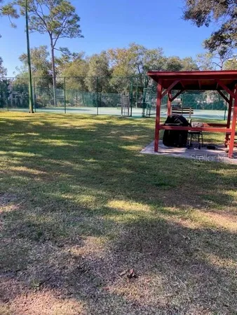 a view of a park that has a car parked in it
