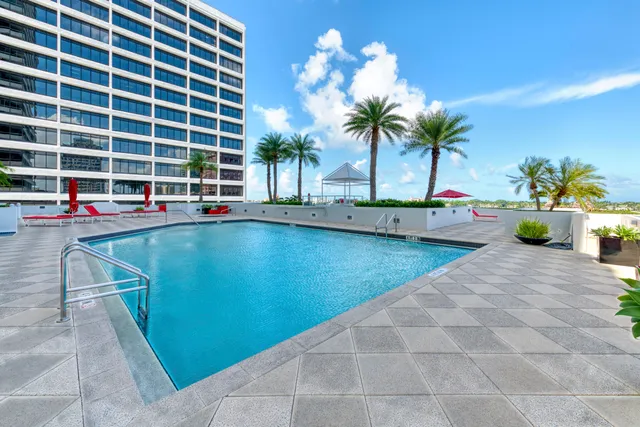 a view of an outdoor sitting area with furniture