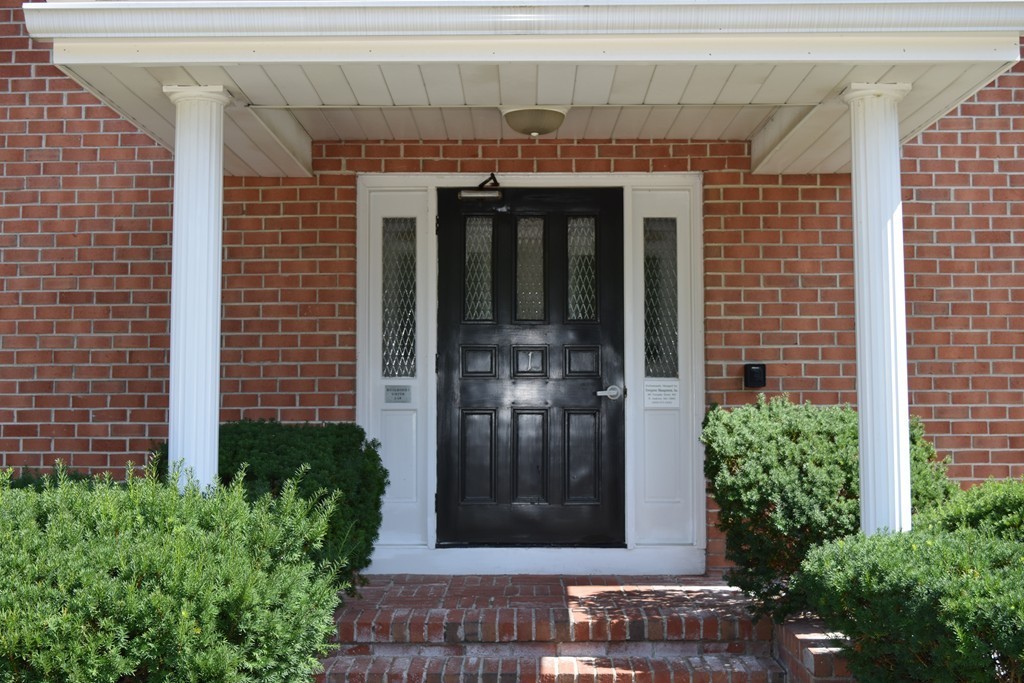 16 Leonard Road, Unit 16 Boxborough, MA 01719 - Photo 3 of 16 a couple of potted plants in front of door
