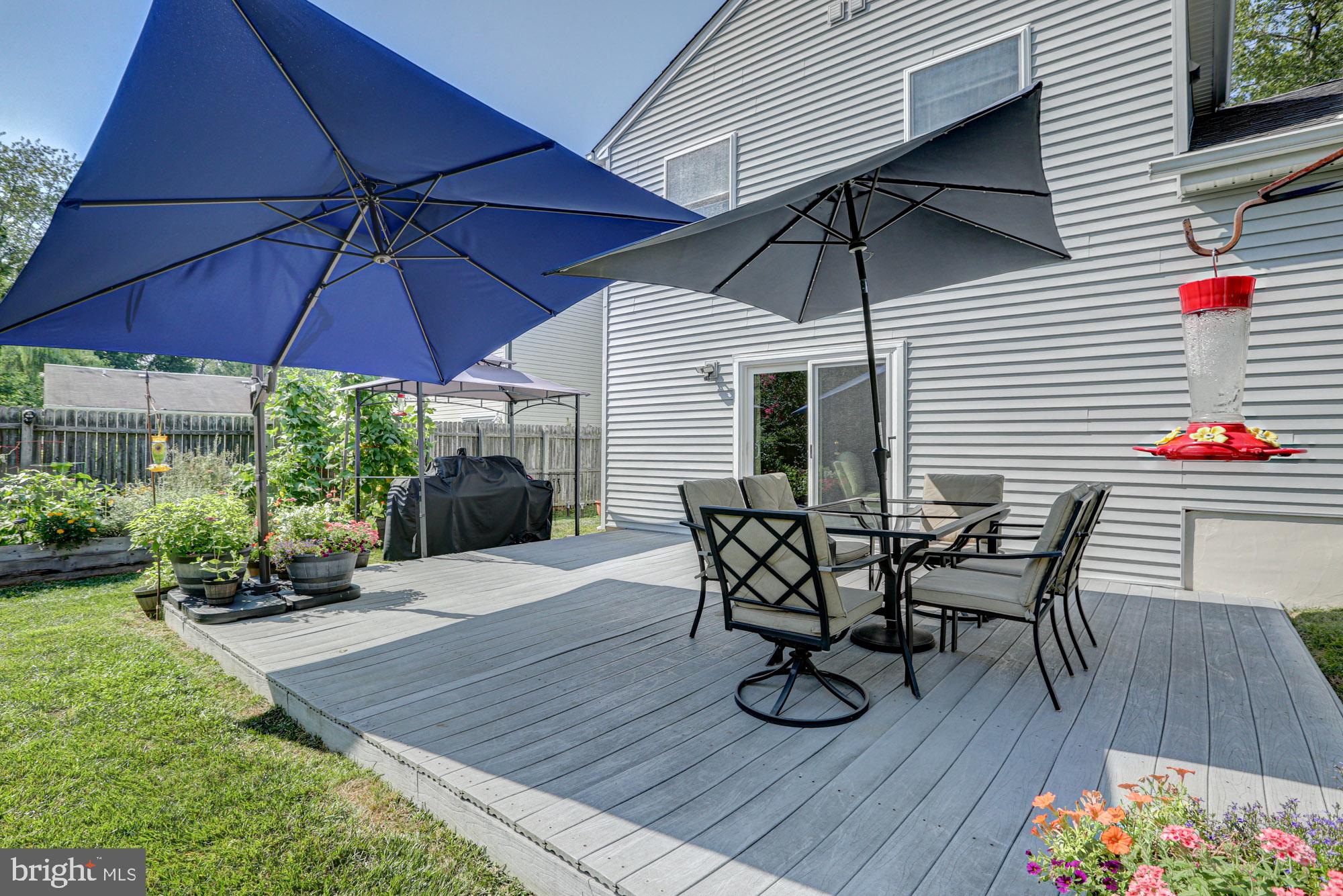 6 3 Rivers Drive Newark, DE 19702 - Photo 15 of 63 Sunny deck with vibrant umbrellas.