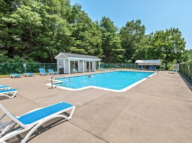 a view of a house with a swimming pool