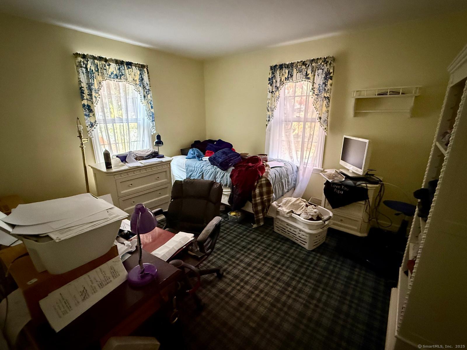 79 Summit Road Prospect, CT 06712 - Photo 14 of 28 a living room with furniture and a window
