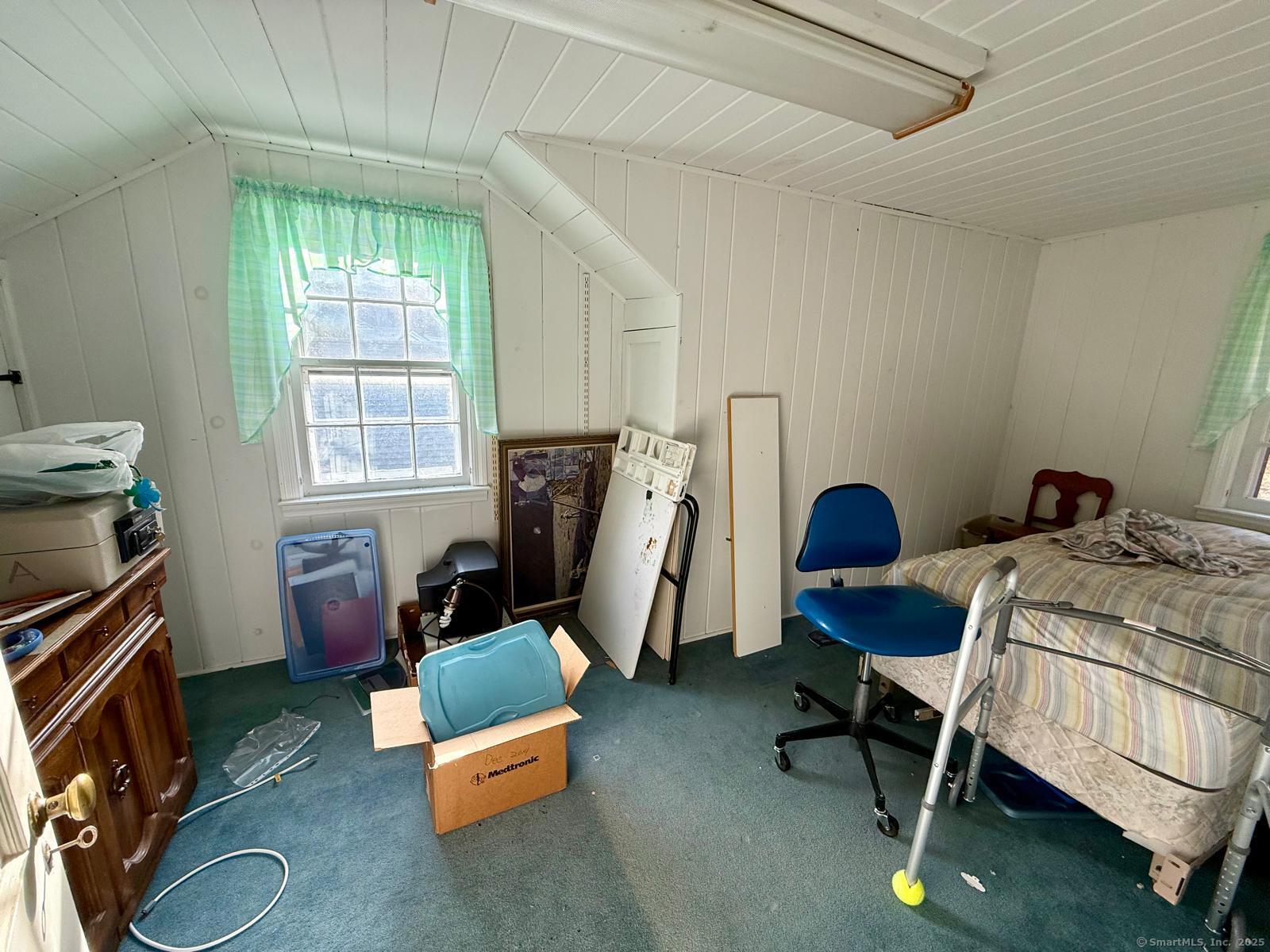 79 Summit Road Prospect, CT 06712 - Photo 20 of 28 a room with furniture and a window