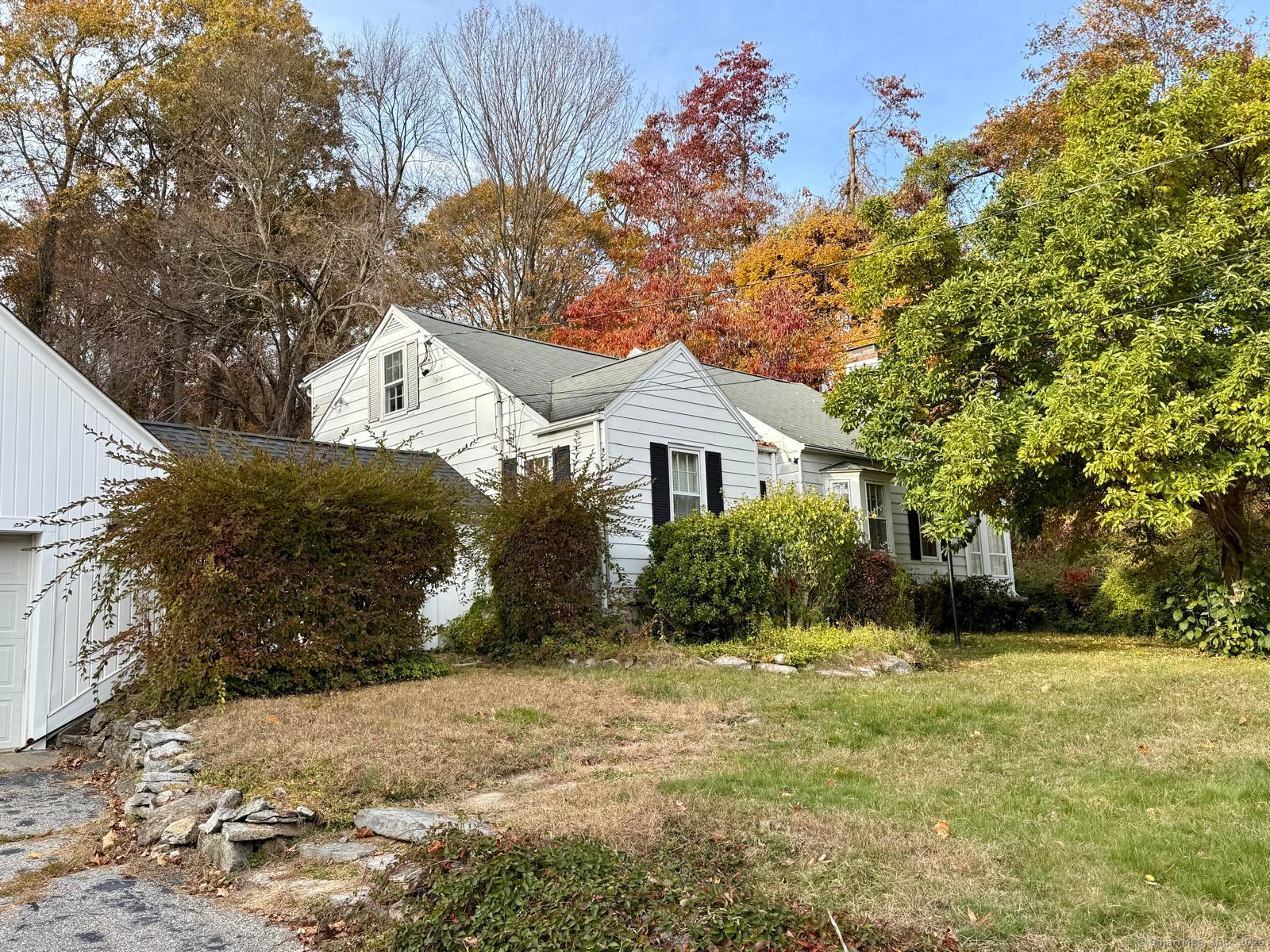 79 Summit Road Prospect, CT 06712 - Photo 2 of 28 a front view of a house with a yard