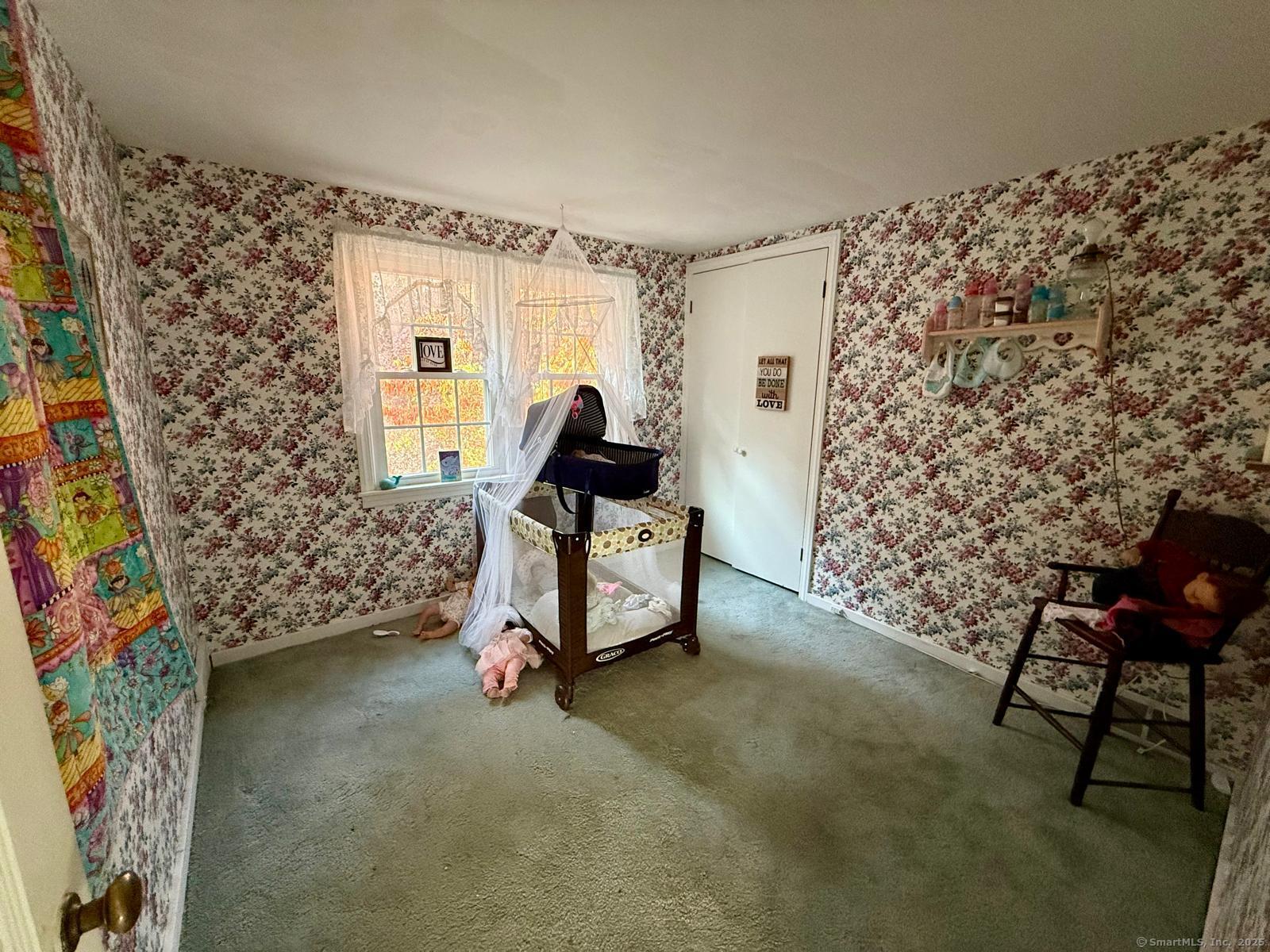 79 Summit Road Prospect, CT 06712 - Photo 21 of 28 a bedroom with bed and a window