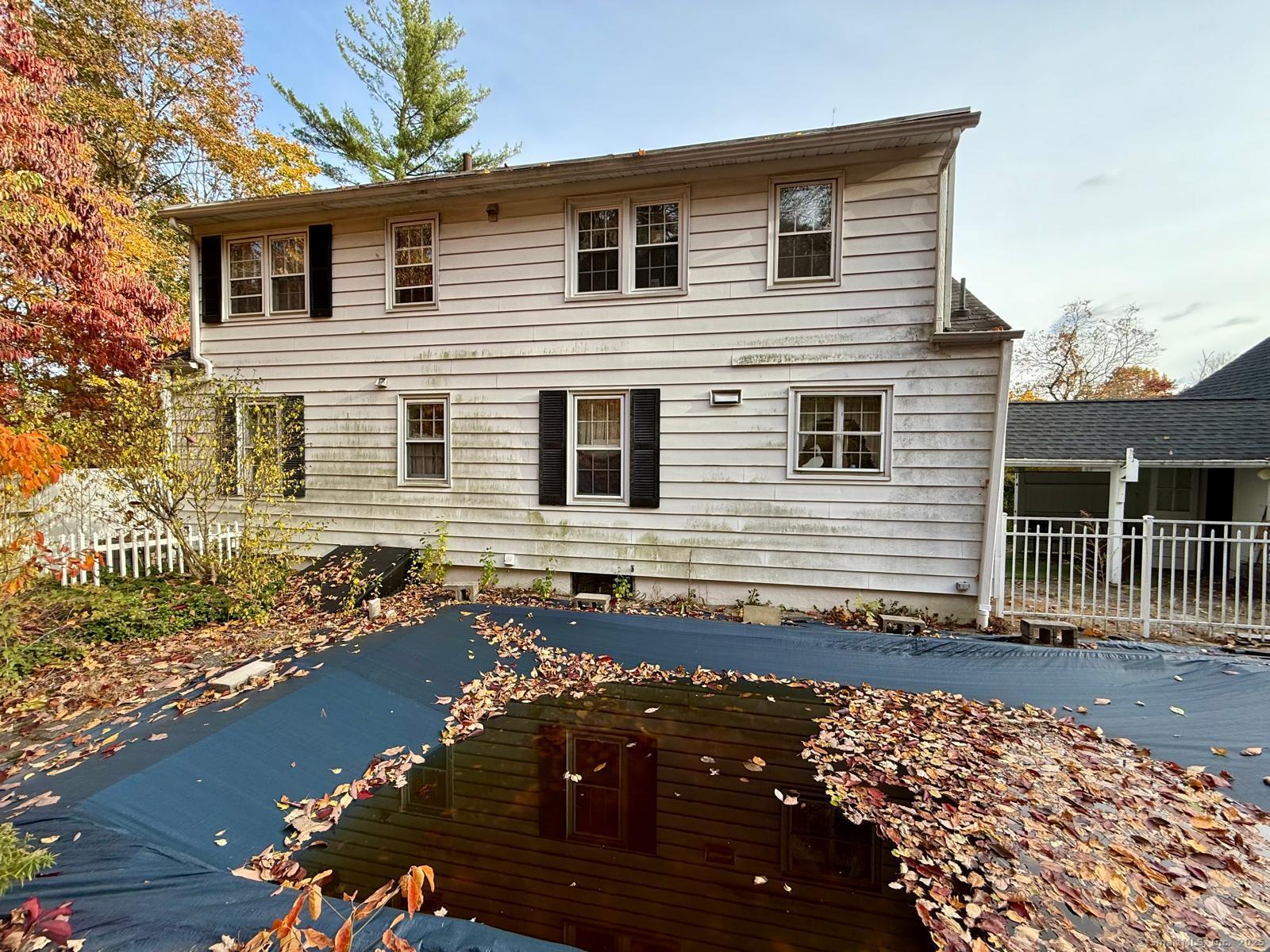 79 Summit Road Prospect, CT 06712 - Photo 23 of 28 a front view of a house with a yard