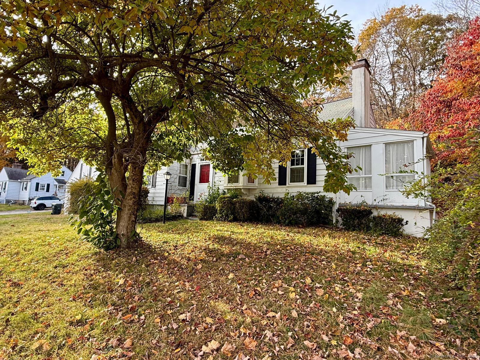 79 Summit Road Prospect, CT 06712 - Photo 5 of 28 a front view of a house with a yard