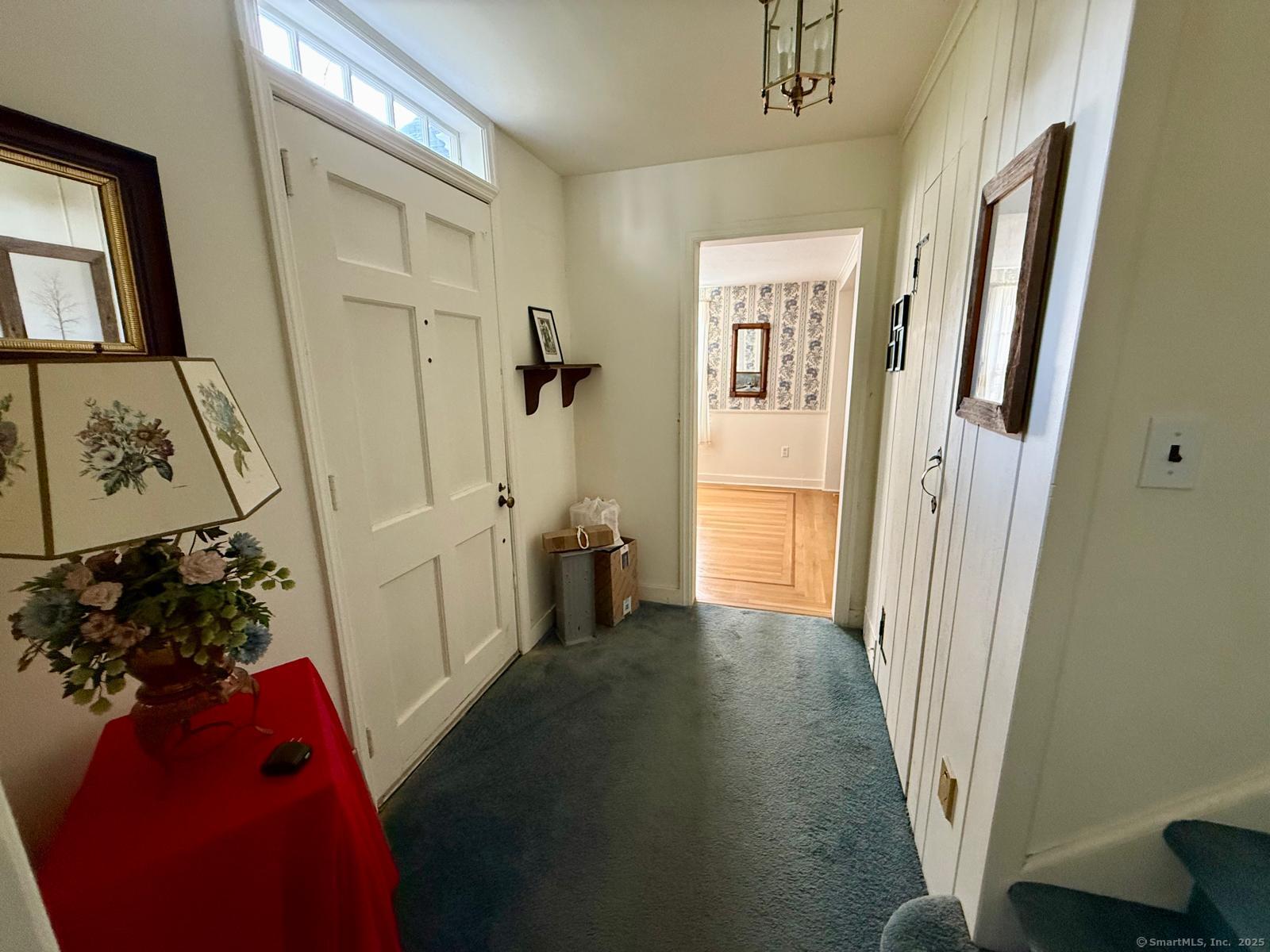 79 Summit Road Prospect, CT 06712 - Photo 6 of 28 a view of a hallway with windows