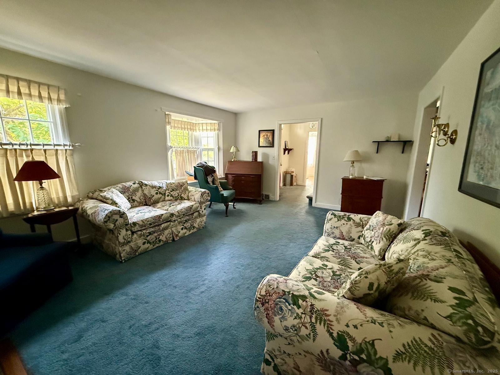 79 Summit Road Prospect, CT 06712 - Photo 9 of 28 a bedroom with bed couch and window