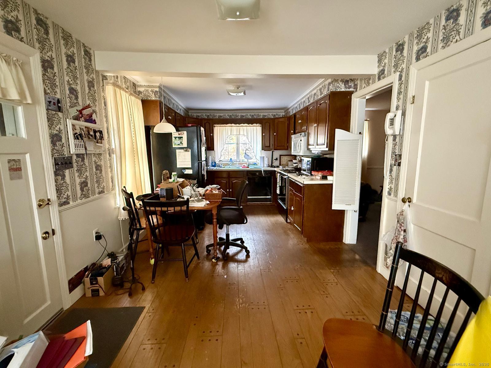 79 Summit Road Prospect, CT 06712 - Photo 10 of 28 a view of a dining room with furniture window and wooden floor