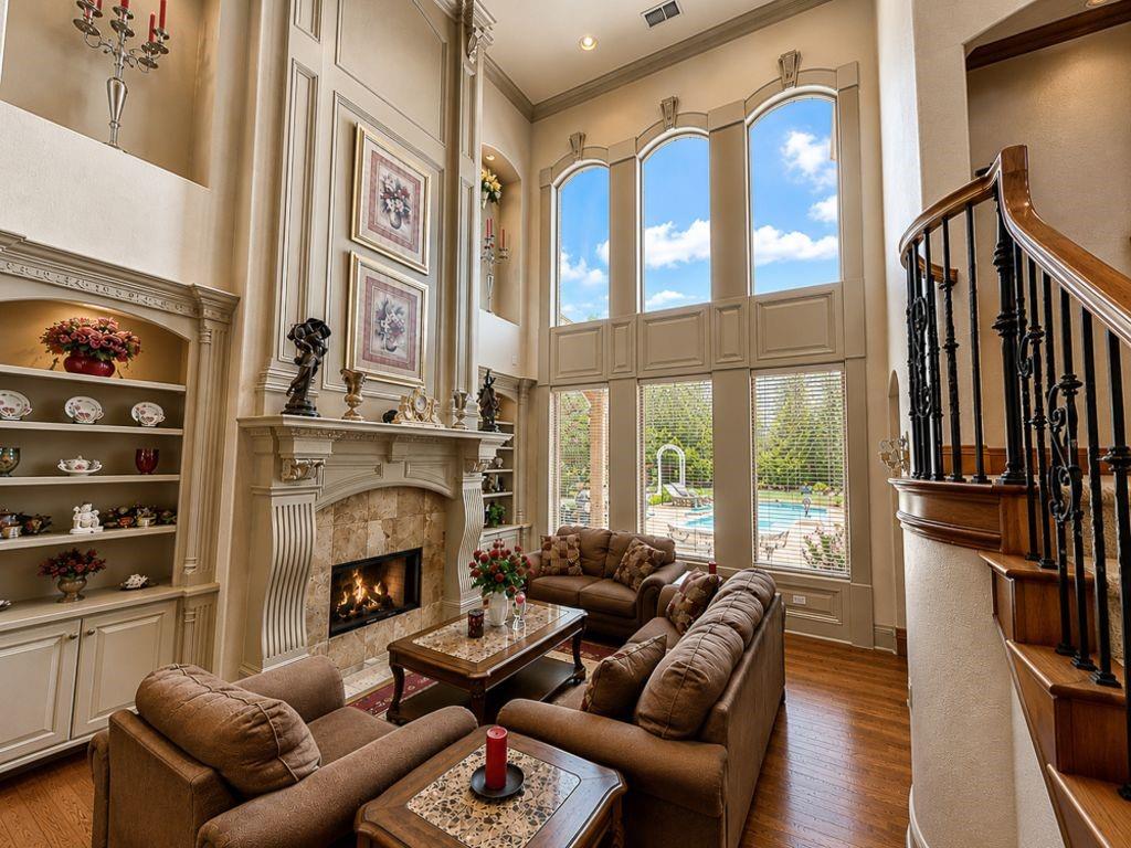 7005 Peter's Path Colleyville, TX 76034 - Photo 4 of 40 a living room with furniture fireplace and flat screen tv