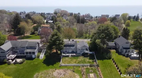 an aerial view of a house with a garden