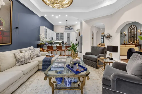 a view of a chairs and table in a backyard