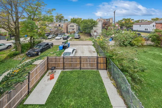 a view of backyard with green space