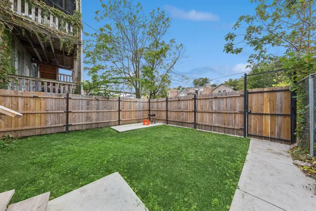 a kitchen with a refrigerator stove and microwave