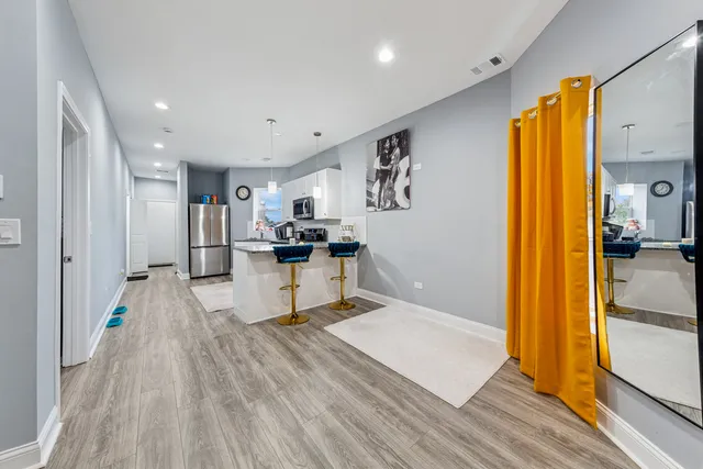 a living room with furniture fireplace and a flat screen tv