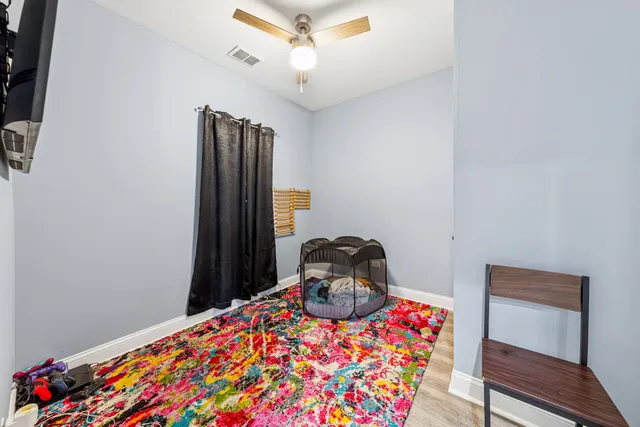 a bathroom with a toilet sink and shower