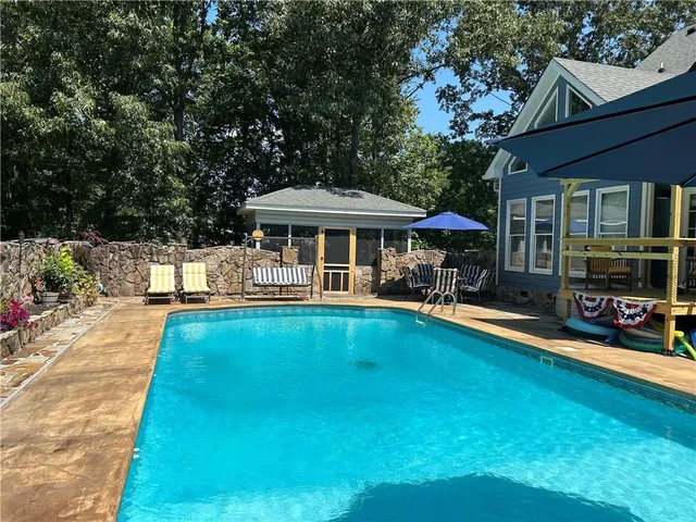 a view of outdoor space yard deck patio and outdoor kitchen