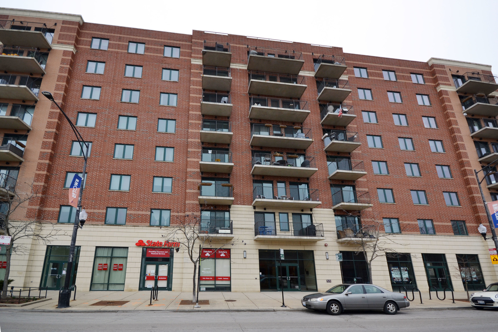 4848 North Sheridan Road, Unit 704 Chicago, IL 60640 - Photo 1 of 8 a front view of a building with lot of windows