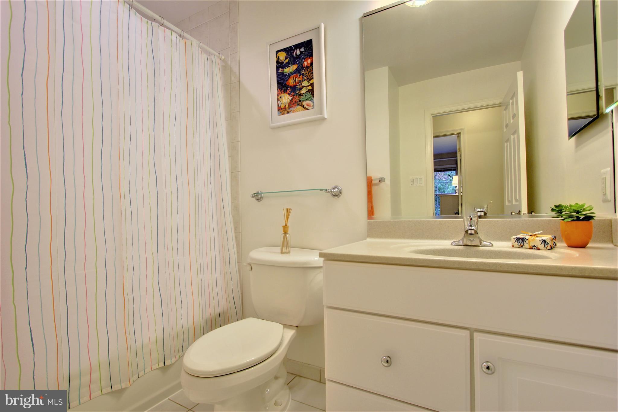 10228 Scaggsville Road Laurel, MD 20723 - Photo 24 of 30 Upstairs hall bath, updated, all ceramic.